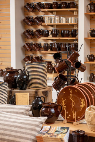 Redware plates, mugs, bowls, and more